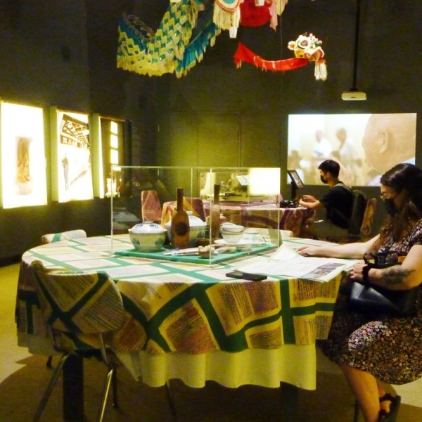 Joint UBC-VIU field study, Vickie, VIU student, at the Museum of Vancouver exhibit, A Seat at the Table, July 12, 2022.